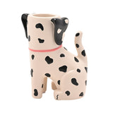 Spotted Dog Resin Matchstick Holder with Pink Collar, a white ceramic-style figurine of a seated dog with black spots, floppy ears, and an opening atop its head, shown on a plain white background.