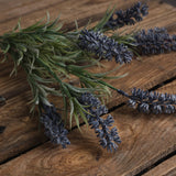 Hill Interiors Small Lavender Spray with slim grey-green foliage and deep purple clustered florets, resting on rustic wooden planks.
