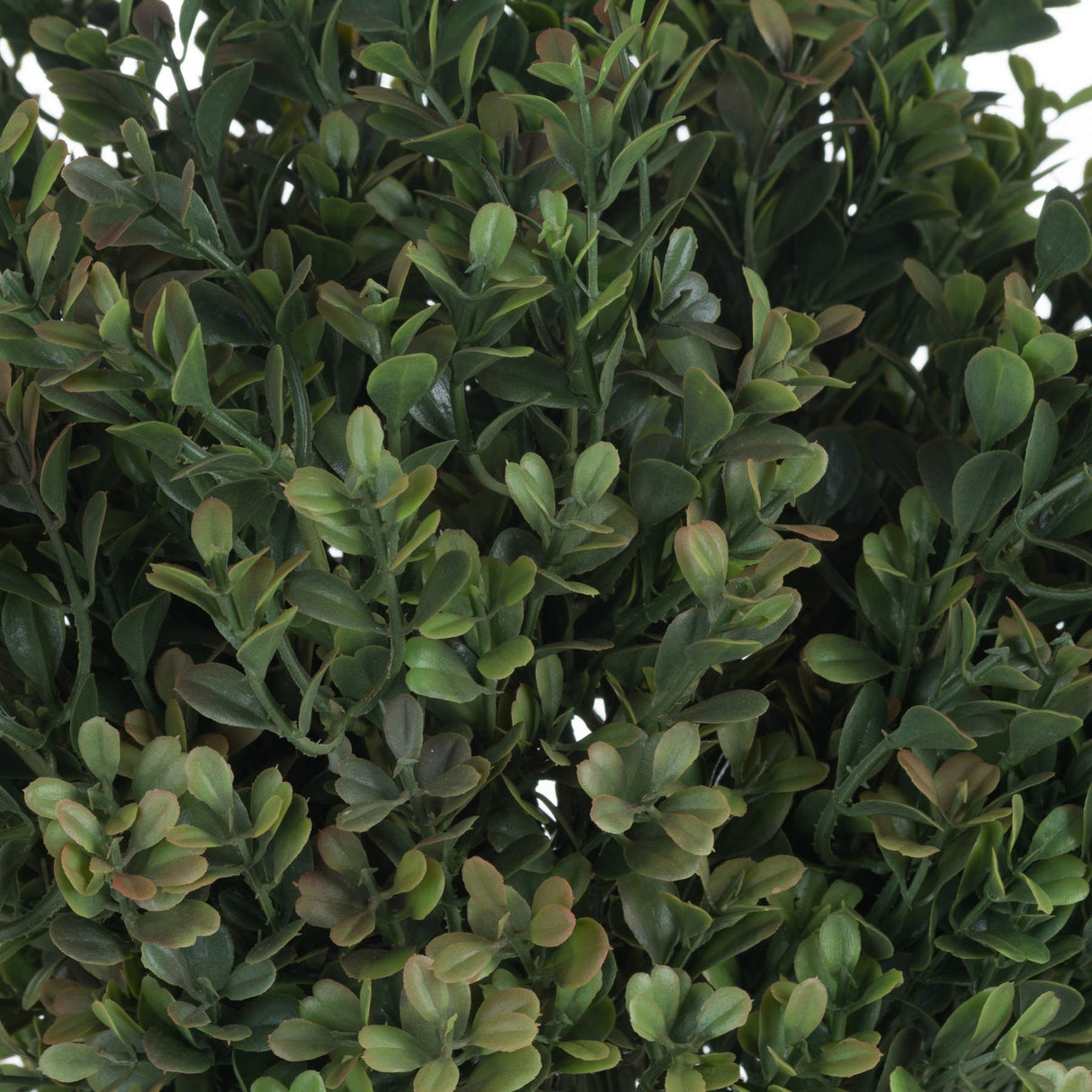 Close-up of Hill Interiors Red Tipped Leaf Spray showing dense faux foliage with fine veining and a gradient from deep green to red-tinged tips.