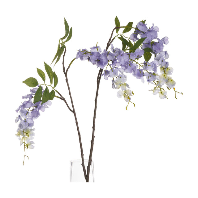 Hill Interiors Lilac Wisteria faux flower stem with cascading purple blooms and green leaves, displayed in a clear glass vase against a white background.