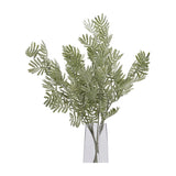 Hill Interiors Silver Wattle Leaf faux foliage stems with feathery frond-like leaflets in a soft silver-green tone, arranged in a clear glass vase.