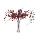 Hill Interiors Ornamental Burgundy Leaf faux foliage stems with veined red leaves arranged in a tall clear glass vase on a white background.