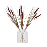 Hill Interiors Ruby Triple Grass Stem faux plants with red feathery plumes and slender green leaves arranged in a clear glass vase on a white background.