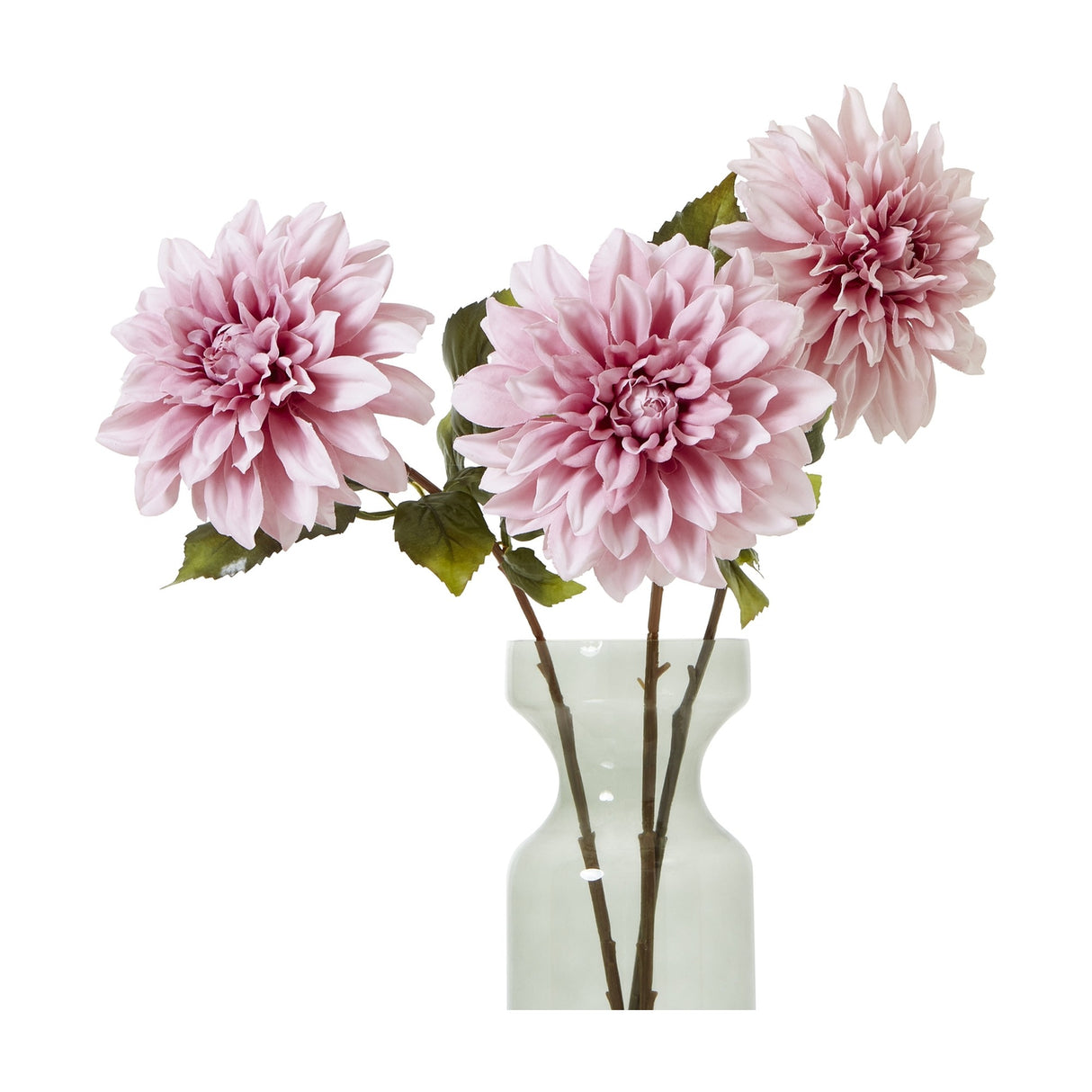 Three Hill Interiors Pink Dahlia faux stems with layered blush petals and green leaves arranged in a clear glass vase against a white background.