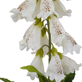 Close-up of Hill Interiors White Foxglove faux flower stem showing tubular bell-shaped blooms with brown speckling and green buds against a white background.