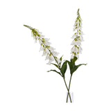 Hill Interiors White Foxglove faux flower stems with speckled bell-shaped blooms and green leaves, displayed in a slim glass vase against a white background.