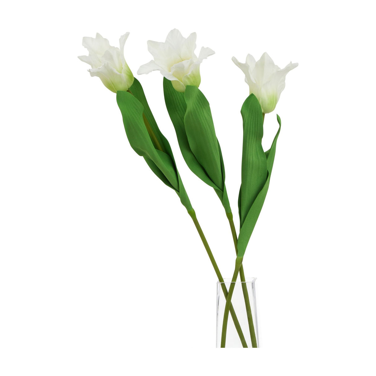 Three Hill Interiors White Parrot Tulip faux stems with ruffled white petals and long green leaves arranged in a clear glass vase.