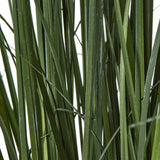 Close-up of the Hill Interiors Large Purple Agapanthus Plant In Pot showing the strappy green plastic leaves and upright stems against a plain background.