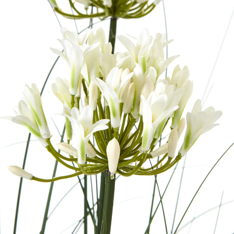Close-up of Hill Interiors Large White Agapanthus faux plant with clustered white florets and green-tipped buds on slender stems against a white background.