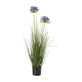 Hill Interiors Blue Agapanthus faux potted plant with two purple flower heads rising above long green grass-like leaves in a black pot on a white background.