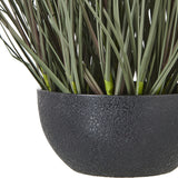 Close-up of Hill Interiors Fountain Grass Plant In Pot, showing slender green blades rising from a textured matte black bowl planter.