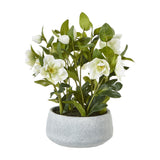 Hill Interiors White Hellebore Plant faux arrangement with white cup-shaped blooms and green foliage in a textured grey pot, on a plain background.