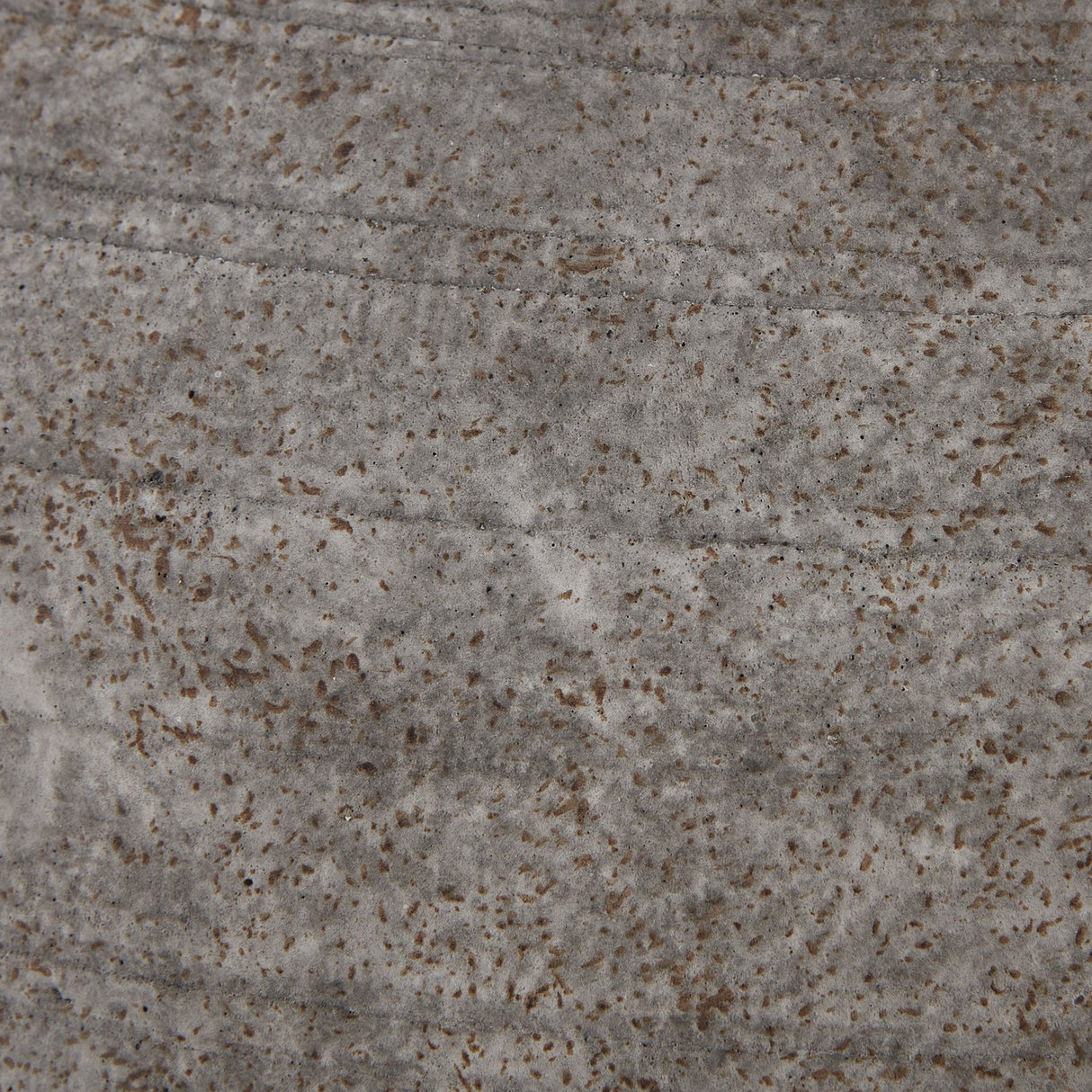 Close-up of the Hill Interiors Hellenic Extra Large planter's aged grey stone-effect finish, showing weathered ridged texture with rust-toned speckling.