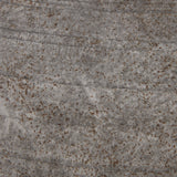 Close-up of the Hill Interiors Hellenic Extra Large planter's aged grey stone-effect finish, showing weathered ridged texture with rust-toned speckling.