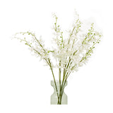 Hill Interiors White Cymbidium Spray faux orchid stems with layered white blooms and green stems arranged in a tall green glass vase.