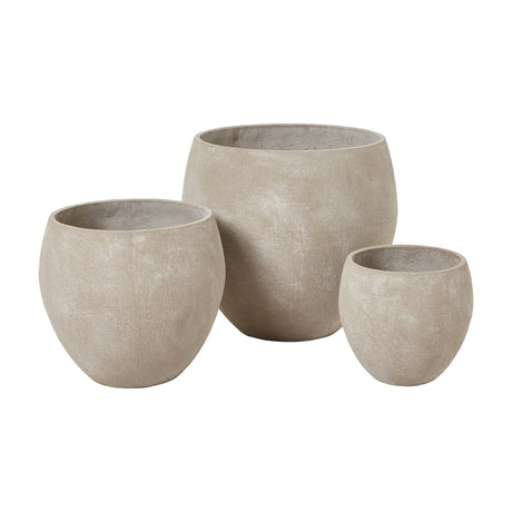Hill Interiors Kyros Shaded Sand Set of 3 Planters in graduated sizes, showing rounded beige pots with a shaded sand finish on a plain background.