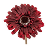 Hill Interiors Burgundy Gerbera Stem shown close-up with deep red layered petals fanning around a textured dark centre on a plain white background.