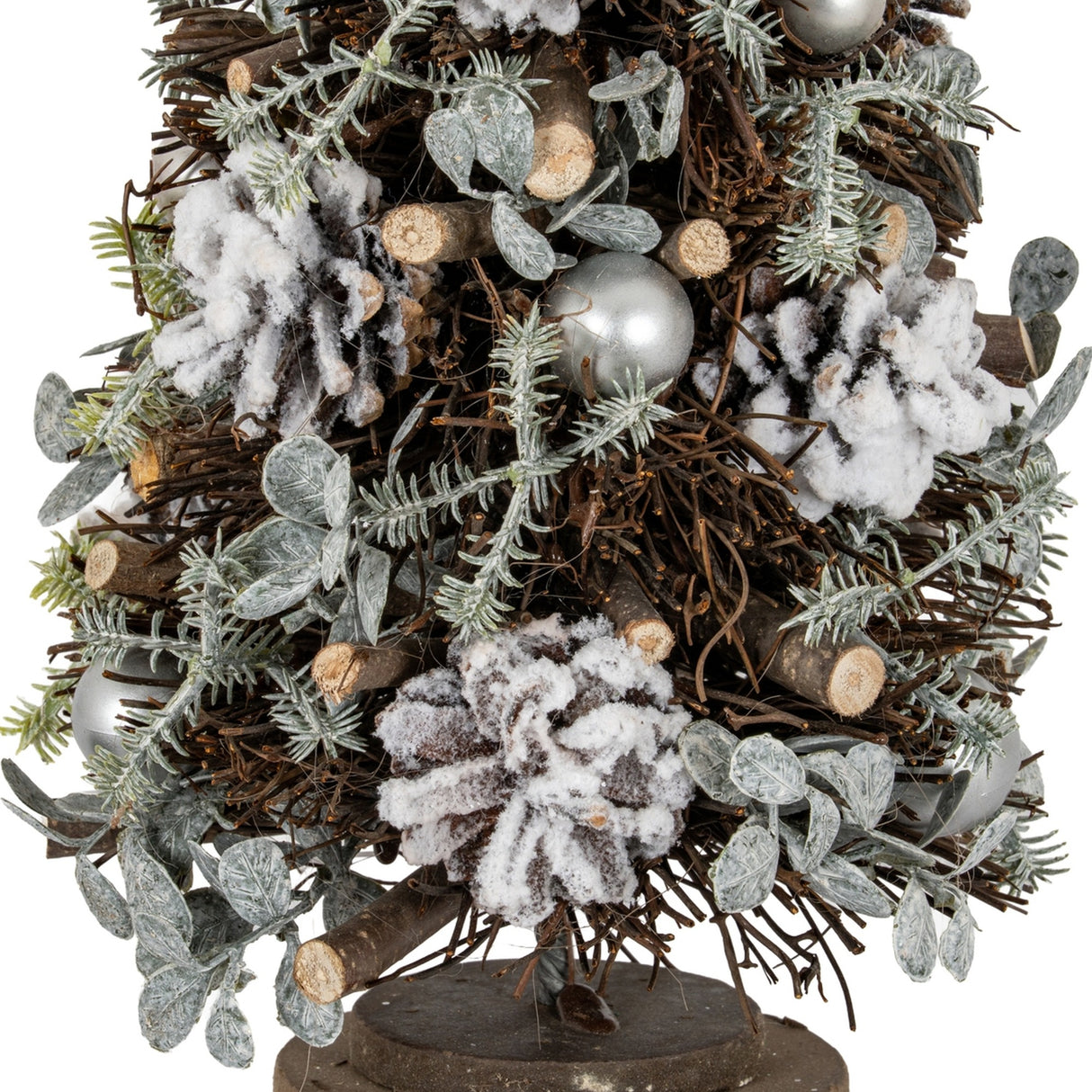Close-up of Hill Interiors Medium Frosted Forest Tree showing frosted pinecones, silver pearl baubles and green needles on a twig conical base.