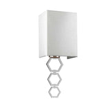 Introducing the Ria Small 1 Light Wall Light in Polished Chrome, featuring a sleek and contemporary design ideal for home or office lighting. It boasts a modern rectangular white shade paired with a decorative base of three interconnected hexagonal metal rings.