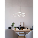 Riaza Pendant Light 83cm in white, a continuous looped LED band suspended on fine wires above a dining table in a light-toned room.