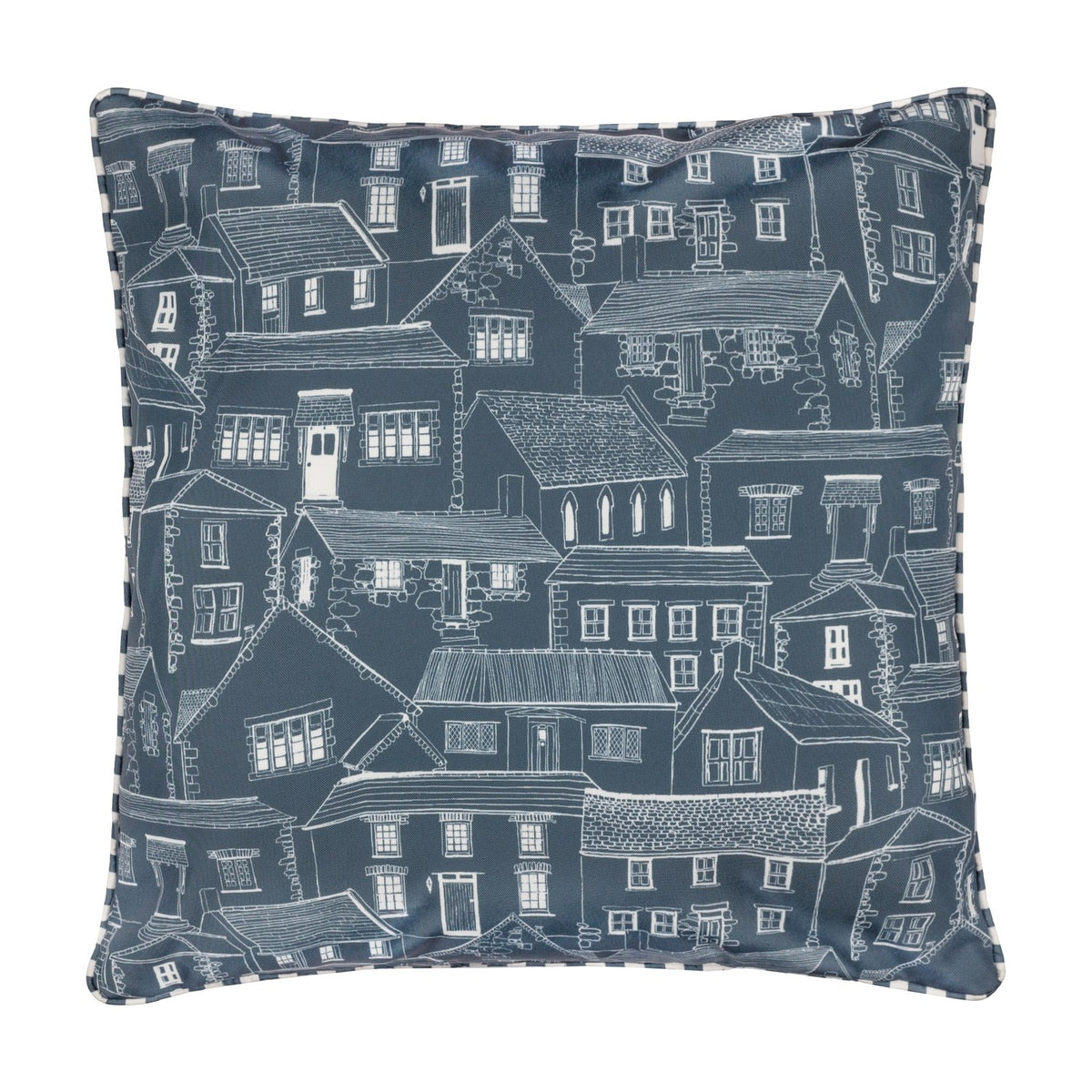 Square Abersoch Town cushion in sail blue with white line-drawn coastal houses and a church, finished with a striped piped edge, shown on a white background.