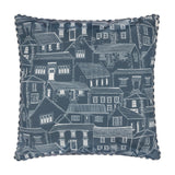 Square Abersoch Town cushion in sail blue with white line-drawn coastal houses and a church, finished with a striped piped edge, shown on a white background.