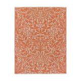 Acorn Tonal Jacquard Cotton Blend Throw in brick orange, featuring an all-over oak leaf and acorn botanical pattern on cream, shown with fringed edges on a plain white background.