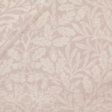 Acorn Tonal Jacquard Linen Throw in natural beige, woven with an oak leaf and acorn pattern in soft tonal shades, edge shown with fringed trim.
