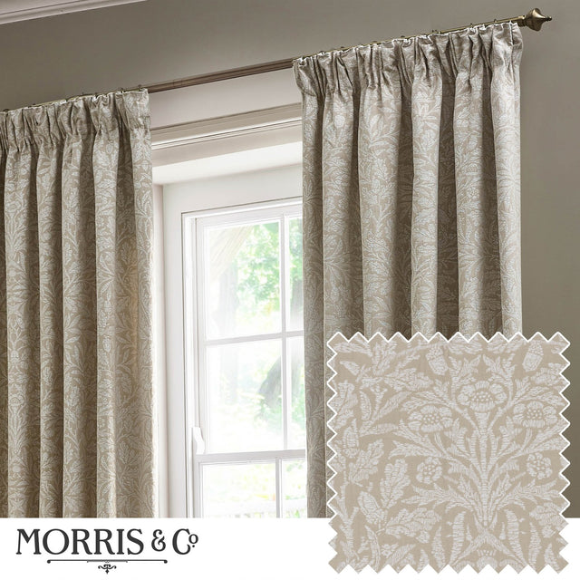 Acorn Tonal Jacquard Linen pencil pleat curtains in beige, hung at a window, with a woven acorn and oak leaf pattern shown on a fabric swatch inset.
