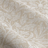 Close-up of Acorn Tonal Jacquard pencil pleat curtain fabric in linen beige, showing woven acorn and oak leaf pattern in matt white-toned jacquard.