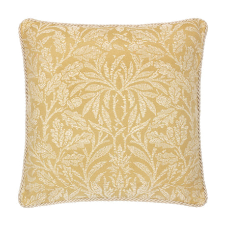 Square gold jacquard cushion with woven cream Acorn branch and foliage pattern, finished with matching twisted cord piping, shown on a white background.