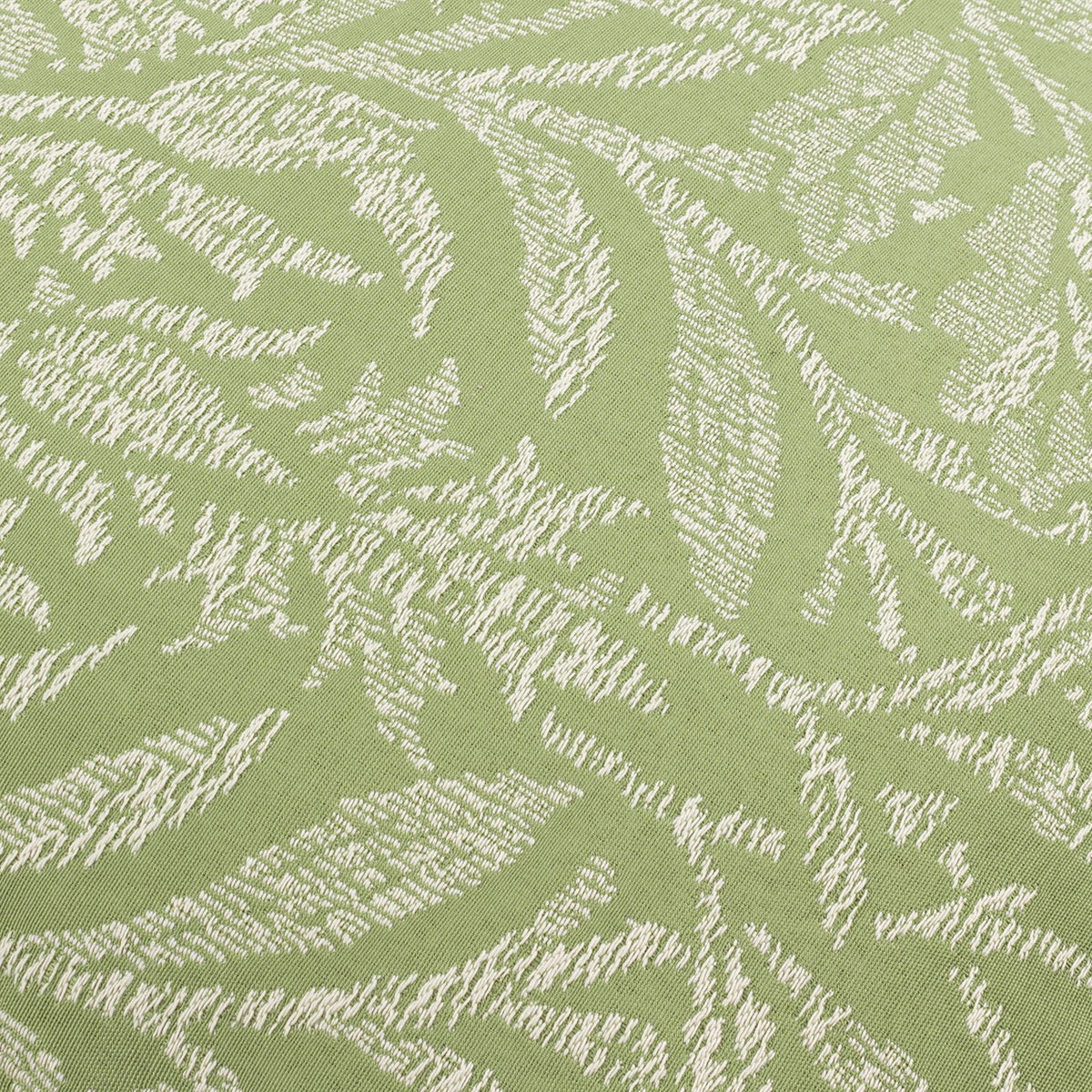 Close-up of Acorn Tonal Jacquard Polyester Cushion in sage, showing woven acorn branch pattern in pale ivory tones against a textured green ground.