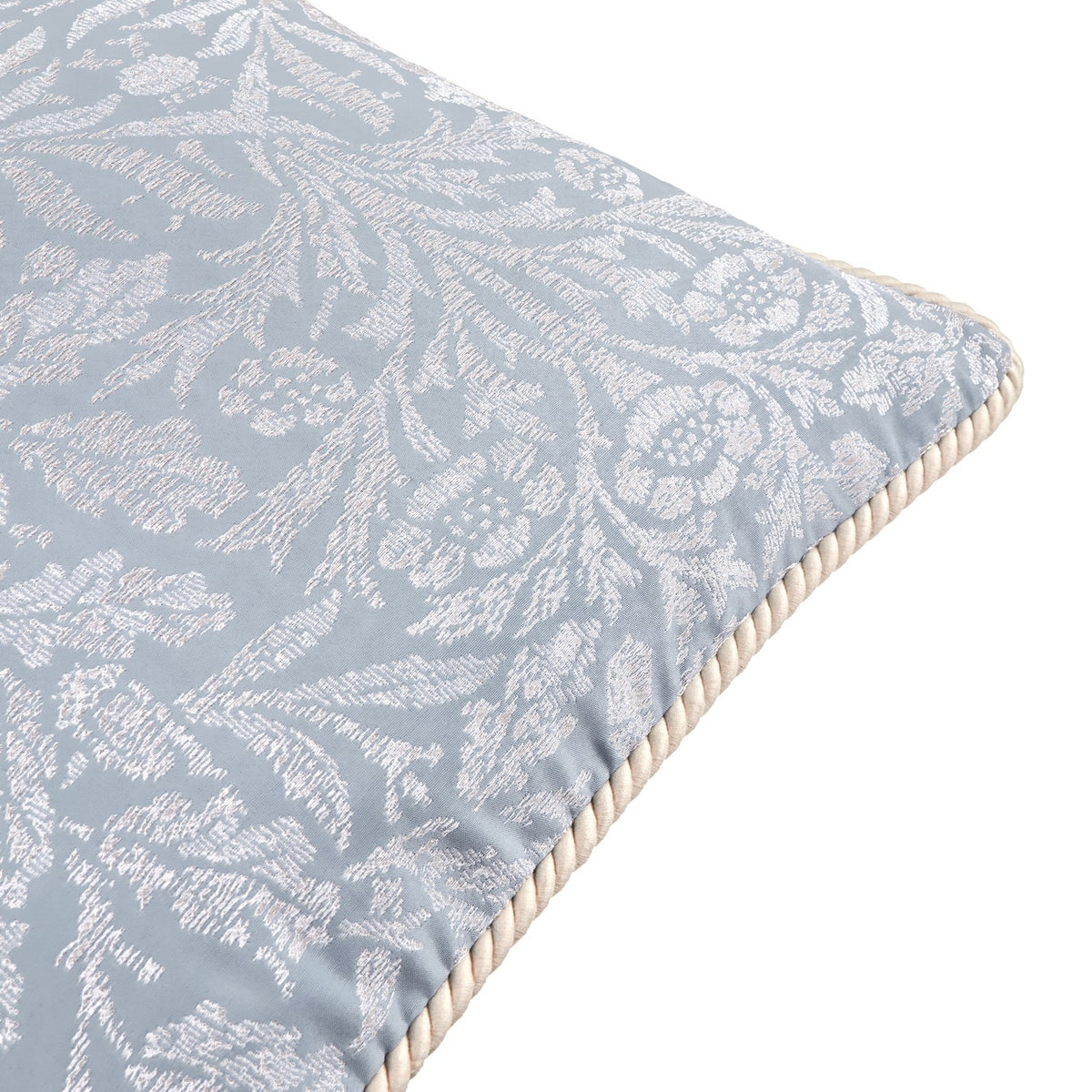 Close-up of a square Acorn Tonal Jacquard Polyester Cushion in Wedgewood blue, showing a woven acorn branch pattern with a cream twisted cord edge trim, on a white background.