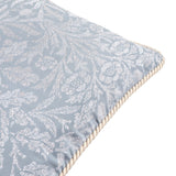 Close-up of a square Acorn Tonal Jacquard Polyester Cushion in Wedgewood blue, showing a woven acorn branch pattern with a cream twisted cord edge trim, on a white background.