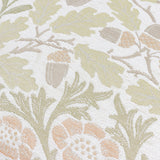 Close-up of the Acorn Multi jacquard cushion in stone and sage, showing woven oak leaves, acorns and small flowering stems on a pale textured polyester fabric.