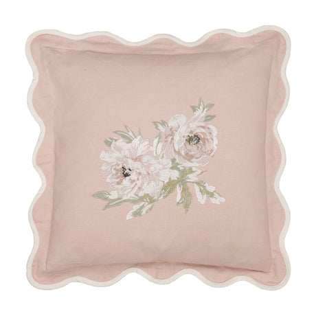 Square Adele Floral Cotton Cushion in Rose with scalloped cream-edged border and embroidered floral spray of two blooms with leaves on a pink cotton ground.
