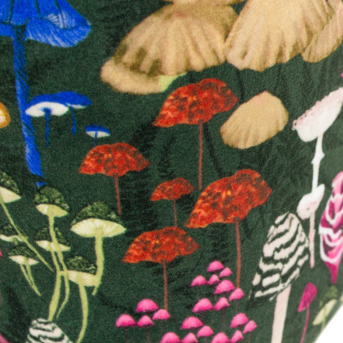Amanita Abstract Velvet Door Stop in green, close-up of the printed fabric showing red, gold, blue and pink mushroom designs on a forest-green ground.