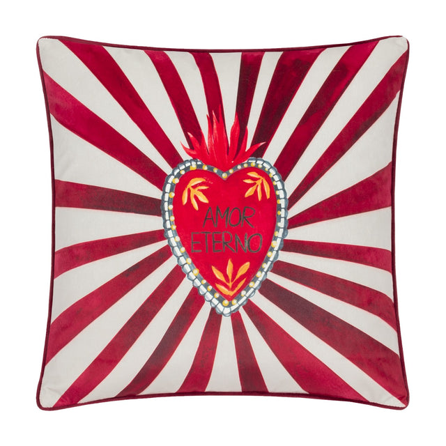 Amor Eterno velvet cushion in red and white, featuring a hand-painted flaming heart with "Amor Eterno" text, radiating stripe design and piped edge trim, shown on a plain white background.