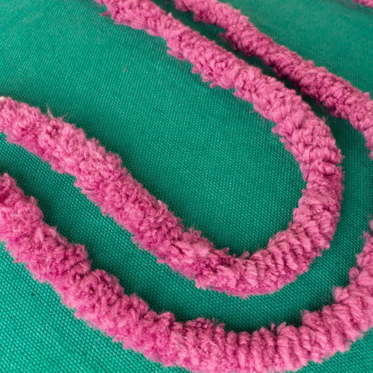 Close-up of the Archie Abstract Cotton Blend Cushion showing a hand-tufted pink looped line pattern in raised fluffy pile against a turquoise cotton-blend cover.
