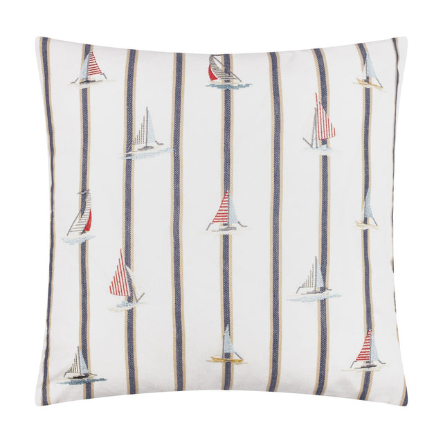 Abersoch Regatta square cushion in ecru cotton with navy and sandy vertical stripes and embroidered sailboats in red, cream and pale blue, shown on a white background.