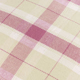 Close-up of the Arrochar Check Linen Cushion in Elderberry, showing a woven tartan check in cream, soft green, dusty rose and deep pink tones on a cotton-linen blend fabric.
