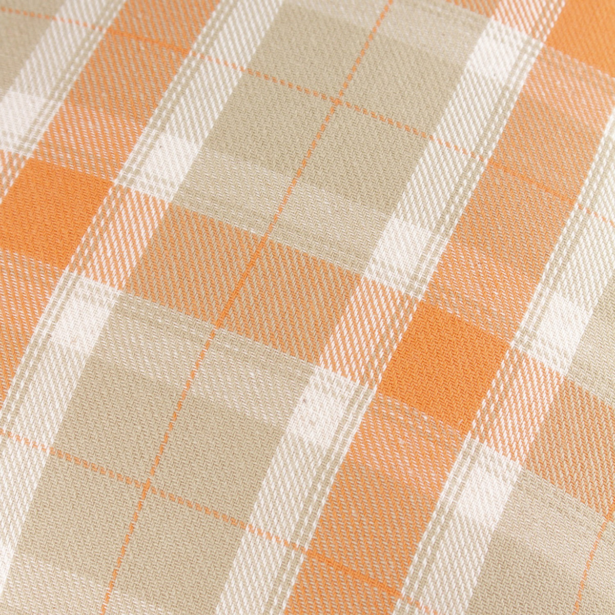 Close-up of the Arrochar Check Linen Cushion in Russet, showing a woven tartan check in orange, sandy taupe and off-white on a cotton-linen blend fabric.