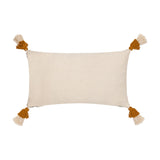 Atlas Tufted Cotton Cushion in Ochre, rectangular bolster shown reverse side in plain cream cotton with ochre and natural double-layer tassels at each corner, on a white background.