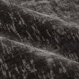 Close-up of Aurelio Chenille Jacquard Eyelet Curtain fabric in charcoal, showing a subtle abstract woven pattern with soft draped folds.