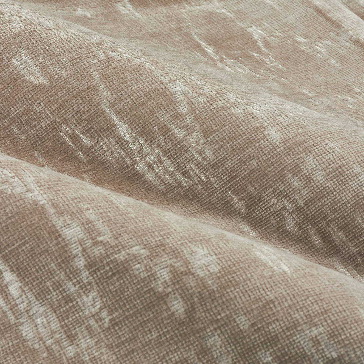 Close-up of Aurelio Chenille Jacquard Eyelet Curtains in mink, showing soft draped folds with a subtle abstract woven pattern in a warm greige tone.