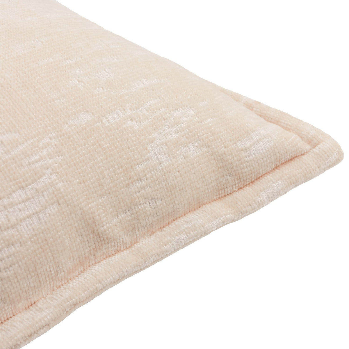 Close-up of the Aurelio chenille jacquard cushion in ivory, showing its dense napped texture, subtle abstract pattern, and folded edge on a white background.