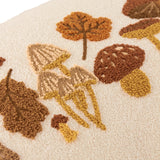 Close-up of the Autumn Forage Woodland cushion in Truffle, showing tufted mushrooms and embroidered autumn leaves in brown, amber and mustard on a cream polyester ground.