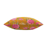 Aviary Velvet Cotton Cushion in gold, shown side-on, with pink peony and floral prints on cotton velvet fabric against a plain white background.