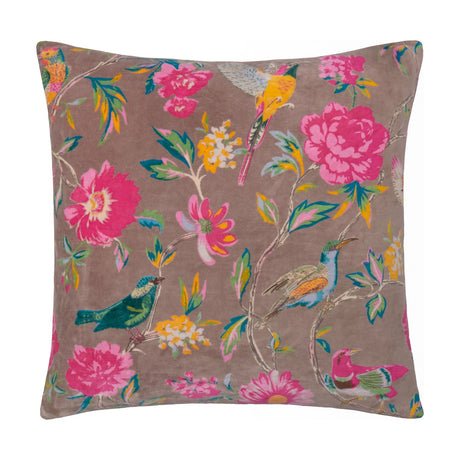 Aviary Velvet Cotton Cushion in mink, square 50 x 50cm with a birds and floral print in pink, teal, and yellow, shown on a plain white background.