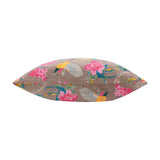 Aviary Velvet Cotton Cushion in mink, shown side-on with pointed ends, featuring a printed pattern of birds and pink flowers on a plain white background.